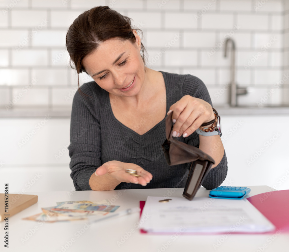Young Woman Counts Money At Home At Table Young Woman Counts Money At Home At Table