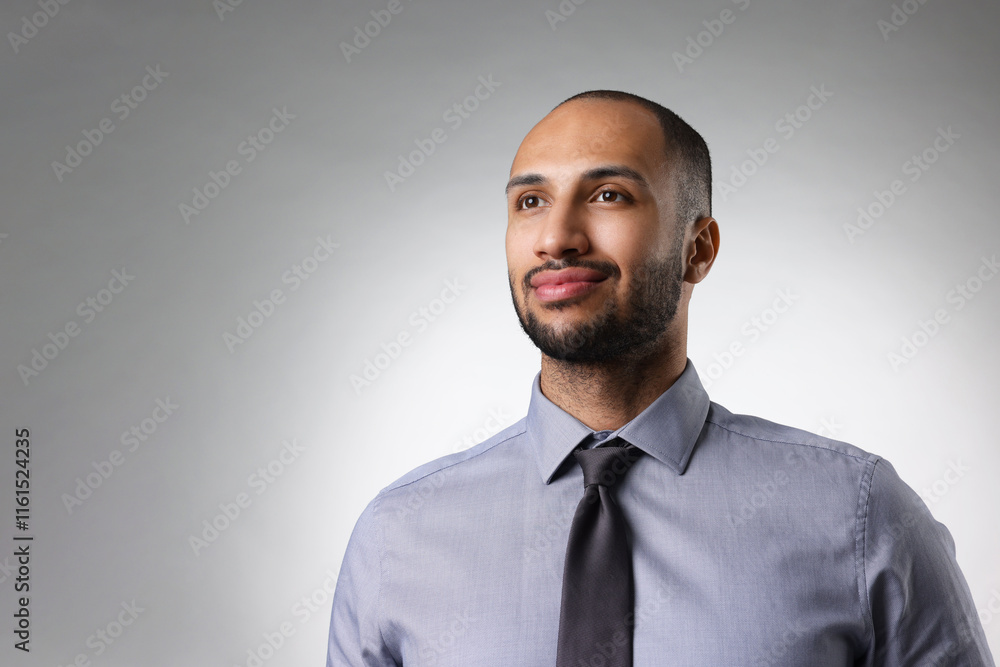 Portrait of businessman on light gray background, space for text Portrait of businessman on light gray background, space for text