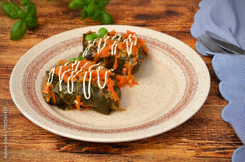 meat dish cabbage rolls with frying, portion on the table