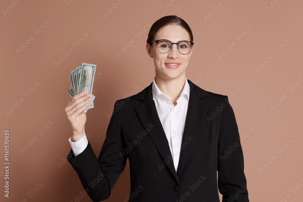 Banker with dollar banknotes on brown background Banker with dollar banknotes on brown background