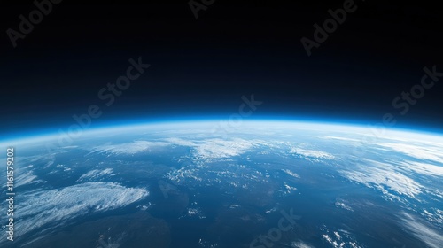Fototapeta Naklejka Na Ścianę i Meble -  Earth's curve viewed from space, showing the atmosphere and land.