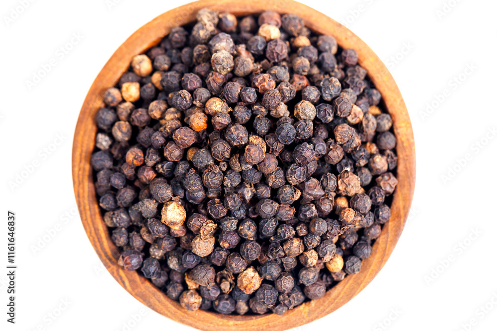 Black peppercorns (black pepper) in a wooden bowl isolated on a white background Black peppercorns (black pepper) in a wooden bowl isolated on a white background