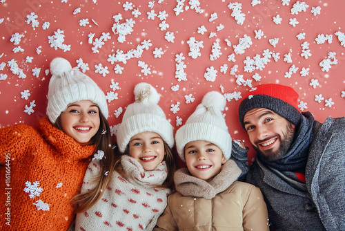 family having fun in the snow