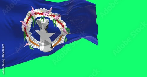 Close-up of Northern Mariana Islands flag waving isolated on green background photo