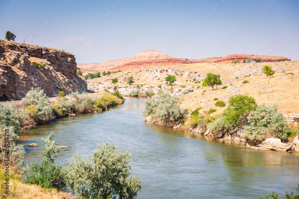 The Bighorn River is a tributary of the Yellowstone, approximately 461 miles long, in the states of Wyoming and Montana in the western United States. The Bighorn River is a tributary of the Yellowstone, approximately 461 miles long, in the states of Wyoming and Montana in the western United States.