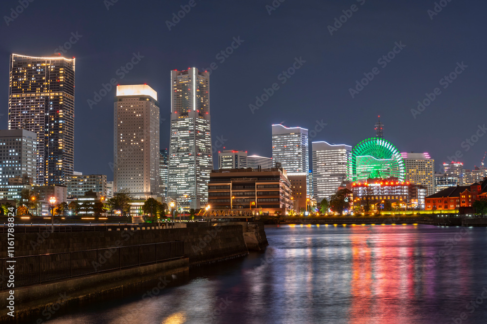 sweet sunset winter and light illumination from Cityscape of Yokohama city, Skyline and office building and downtown in Minatomirai Area, Yokohama city port, Kanagawa, Japan
