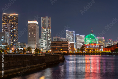 Obraz na płótnie sweet sunset winter and light illumination from Cityscape of Yokohama city, Skyline and office building and downtown in Minatomirai Area, Yokohama city port, Kanagawa, Japan w salonie