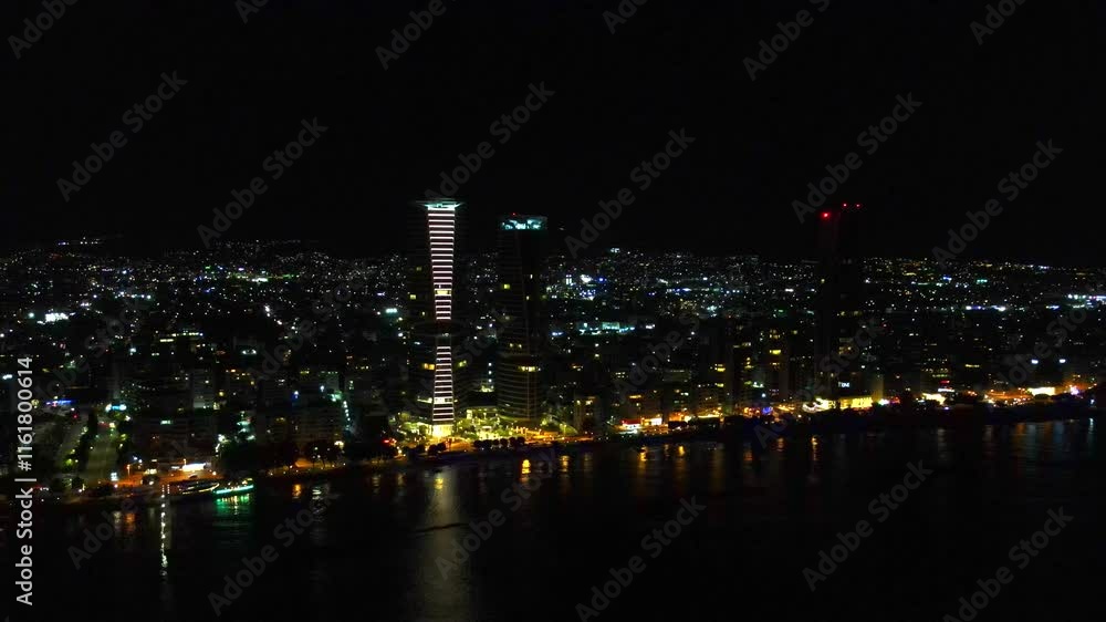 Aerial exploration of Limassol's illuminated urban charm, modern architecture and traffic. High quality 4k footage. Cyprus, Mediterranean Sea Aerial exploration of Limassol's illuminated urban charm, modern architecture and traffic. High quality 4k footage. Cyprus, Mediterranean Sea