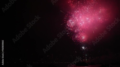 4th of July fireworks, the San Diego downtown over bay is in background