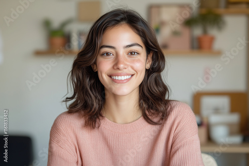 Free Download Hispanic woman entrepreneur in business-casual attire smiles warmly, in a bright and clean office - GFXLoad