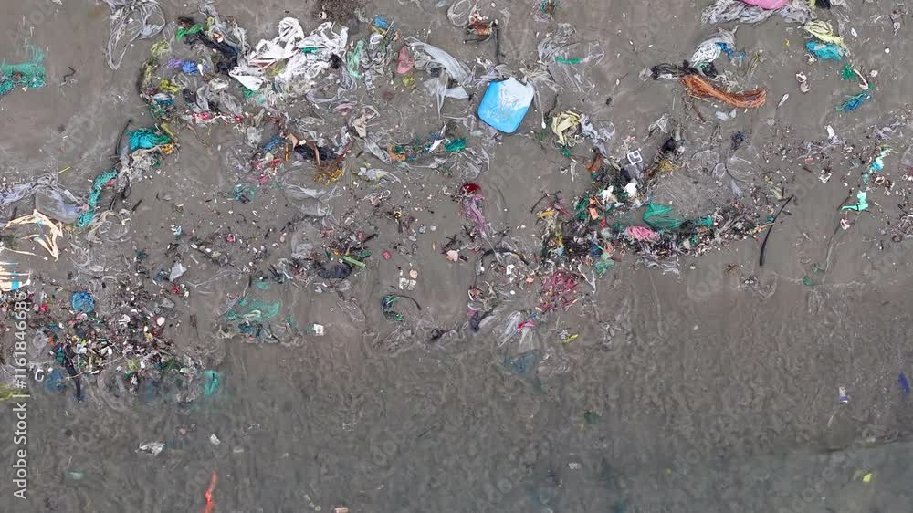 Pollution on the beach in Vietnam. Royalty high-quality free best stock of gabage, plastic, waste trash from the sea to make dirty beach. Waste that polluted the ocean environment, ecological prolem