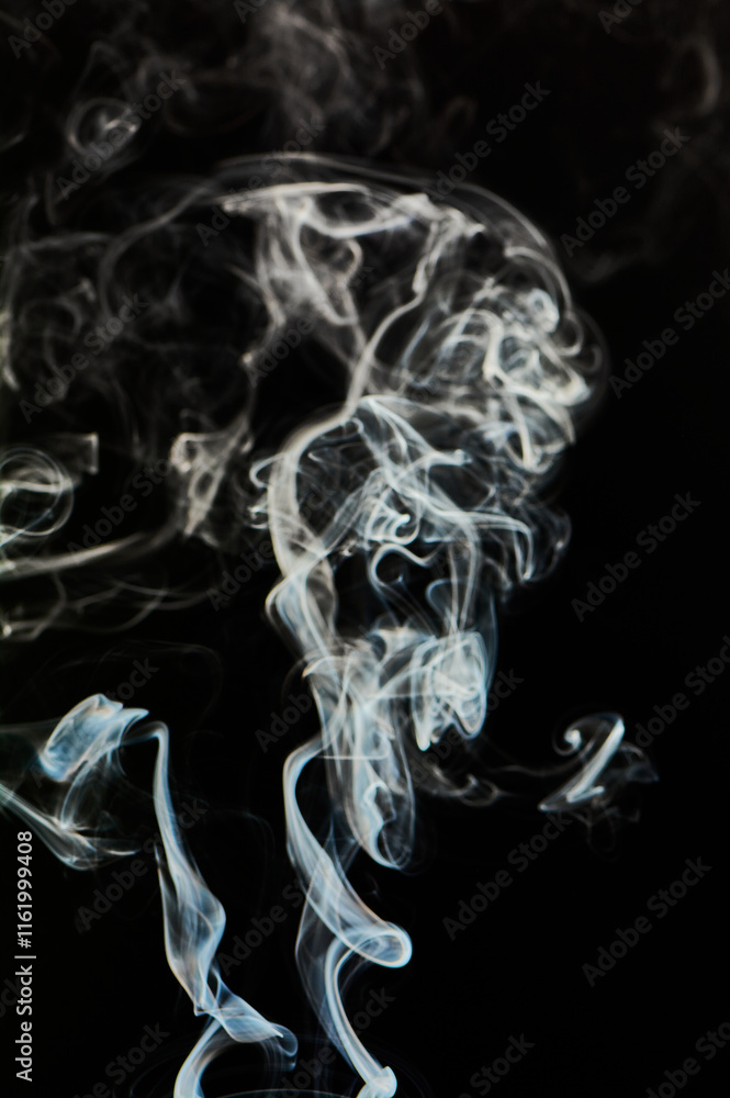 Fototapeta premium The smoke is thick and dark, creating a mood of mystery and danger
