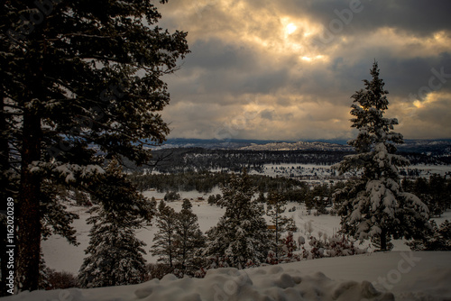 Sunrise over the Pagosa Springs Valley after winter snow storm. photo