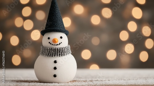 A cheerful snowman wearing a black hat and gray scarf stands against a blurred, warm bokeh background, evoking a festive winter atmosphere.