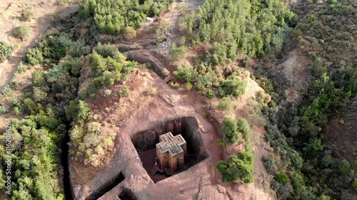 Aerial footage over Saint George Cross shaped rock hewn, Ethiopia
Drone view Saint George Cross shaped rock hewn church, Lalibela, Ethiopia 
