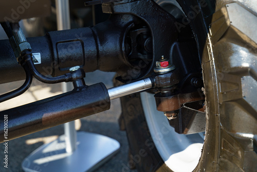 Close-up of tractor steering parts highlighting engineering precision photo