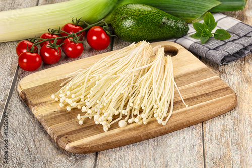 Raw enoki mushroom for cooking photo