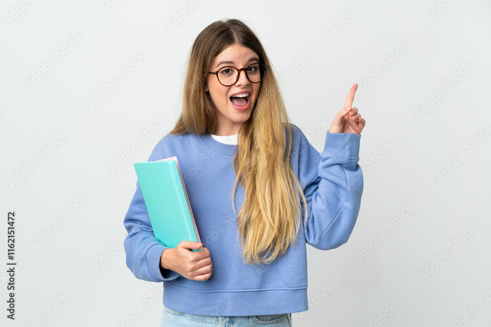 Young blonde student woman isolated on white background intending to realizes the solution while lifting a finger up Young blonde student woman isolated on white background intending to realizes the solution while lifting a finger up