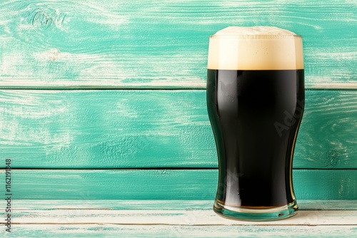 A flat illustration of a pint of Guinness, with its iconic black body and creamy white head photo