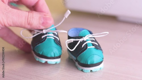 close-up demonstration of doll shoes