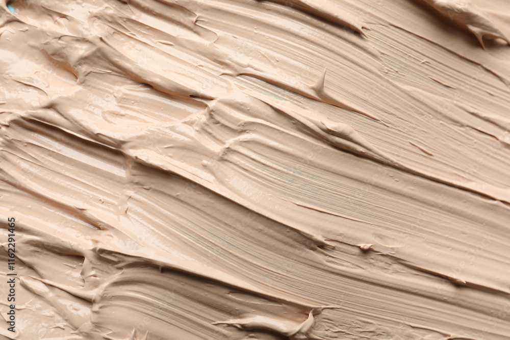 Fototapeta premium Liquid foundation texture. Make up base, BB cream smear background
