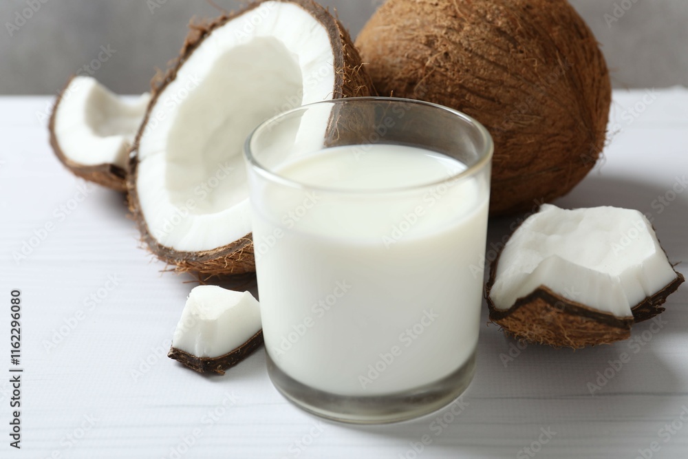 Glass of coconut milk on the table Glass of coconut milk on the table
