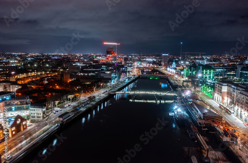 Aerial view of Dublin city center on a quiet Sunday night, showcasing calm streets and lights