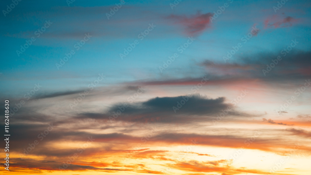 Rich and vibrant sunset gradient with glowing warm colors at the horizon transitioning into a deep blue sky. Rich and vibrant sunset gradient with glowing warm colors at the horizon transitioning into a deep blue sky.