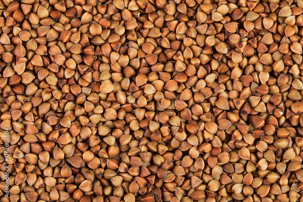 Raw buckwheat as a background. Top view. Flat lay Raw buckwheat as a background. Top view. Flat lay