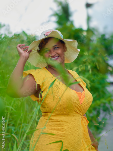 young woman in a hat