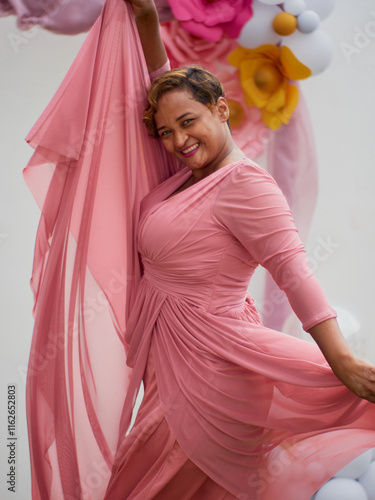 pregnant woman in pink dress