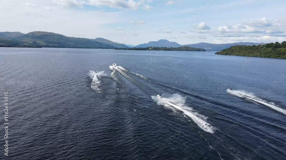 Wakeboarding on Loch Lomond & The Trossachs National Park in Scotland Wakeboarding on Loch Lomond & The Trossachs National Park in Scotland