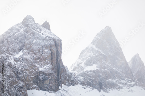Bild auf Leinwand Aiguilles d'Arves covered by snow with mist and clouds