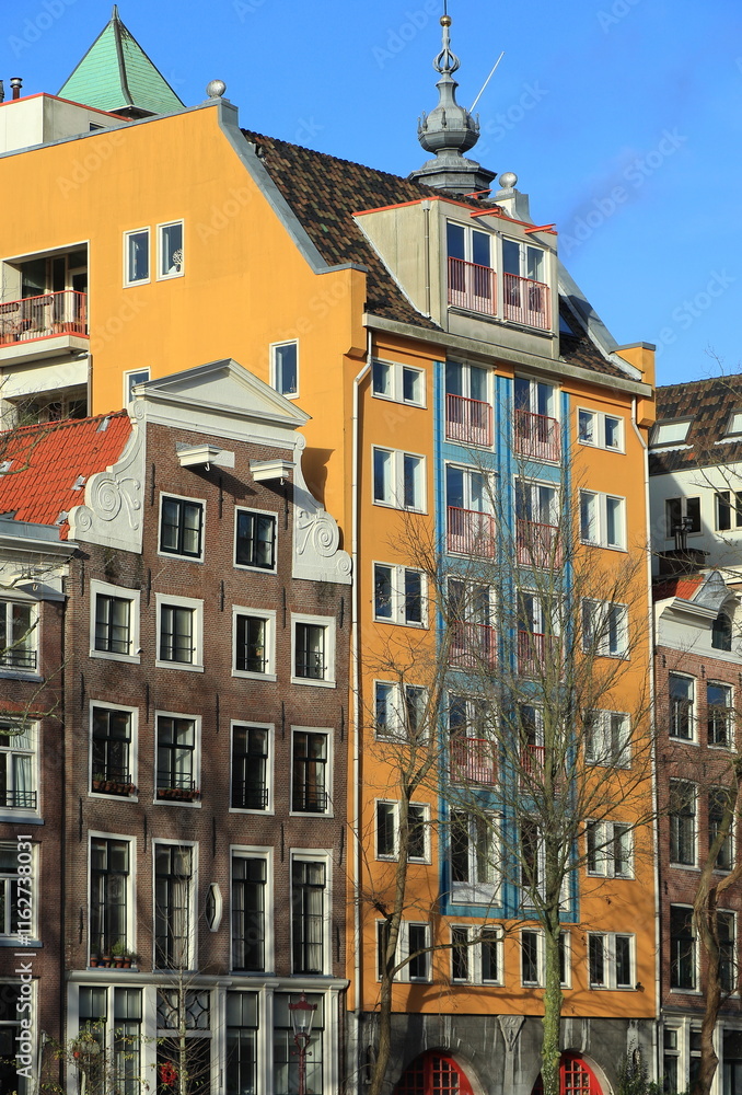 Fototapeta premium Amsterdam Zwanenburgwal Yellow Building Facade, Netherlands