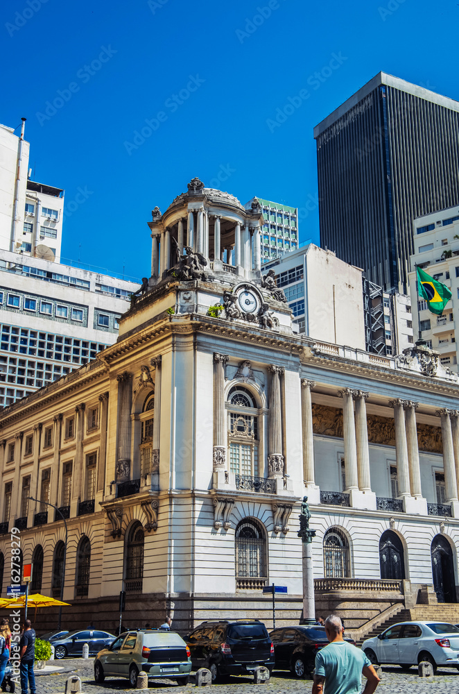 Fototapeta premium Brazil. In Rio de Janeiro, historic and modern buildings coexist under a clear blue sky, showcasing urban evolution.