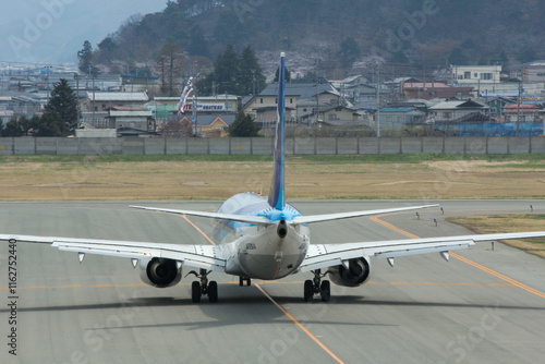 山形空港 小型旅客機のタキシング Plane Taxing in Yamagata Airport photo