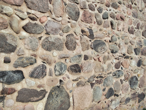 Obraz na płótnie Feldsteine in einer historische Stadtmauer aus dem 13. Jahrhundert w salonie
