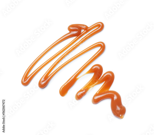 Fotografie Liquid caramel syrup close up isolated on a white background