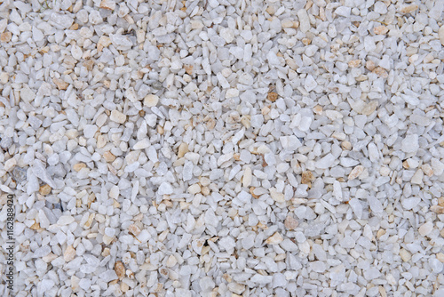 Fine white crushed stone close-up, texture