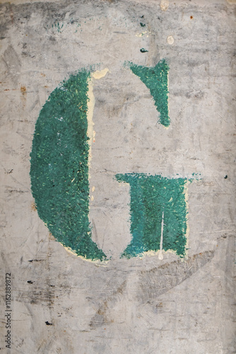 G green letter painted on metal vintage