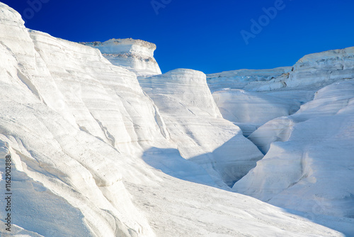 White chalk cliffs in Sarakiniko, Milos island, Cyclades, Greece photo