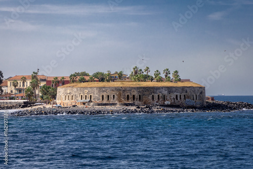 Photo of Fort d'Estrées on Goree Island from the sea in Dakar, Senegal on a sunny day