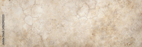 Cracked beige wall texture with weathered details
