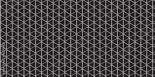 Geometric triangle shapes define this abstract modern background texture, enhanced by grainy noise. The image embodies a sophisticated interplay of lines, angles, and textures,