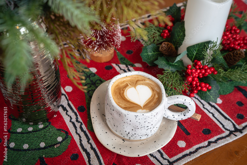 Close up of Hot coffee latte with latte art milk foam in cup mug with Xmas decors and Xmas tree baubles on wood desk Celebrating Merry Christmas and New year,Merry x-mas