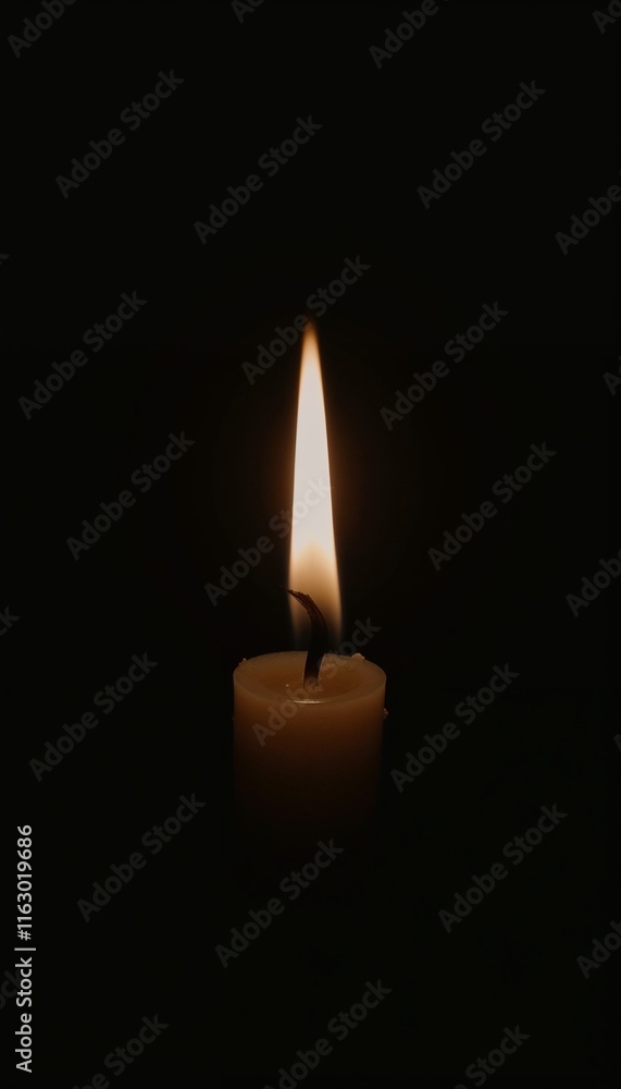 Lit candle with flickering flame on dark background peaceful ambiance Lit candle with flickering flame on dark background peaceful ambiance