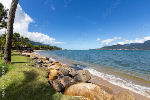 ILHABELA, SP, BRAZIL - DECEMBER 12, 2024: View of Pereque beach with the São Sebastião channel in the background. photo