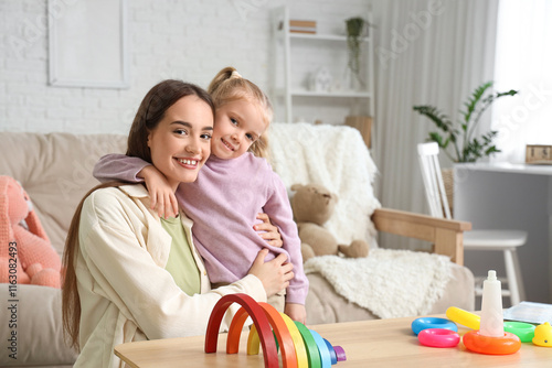 Nanny with cute little girl...