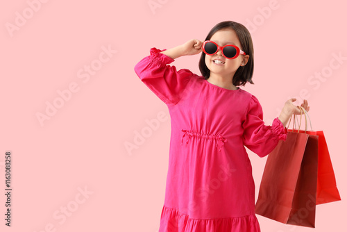 Cute little Asian girl in s...