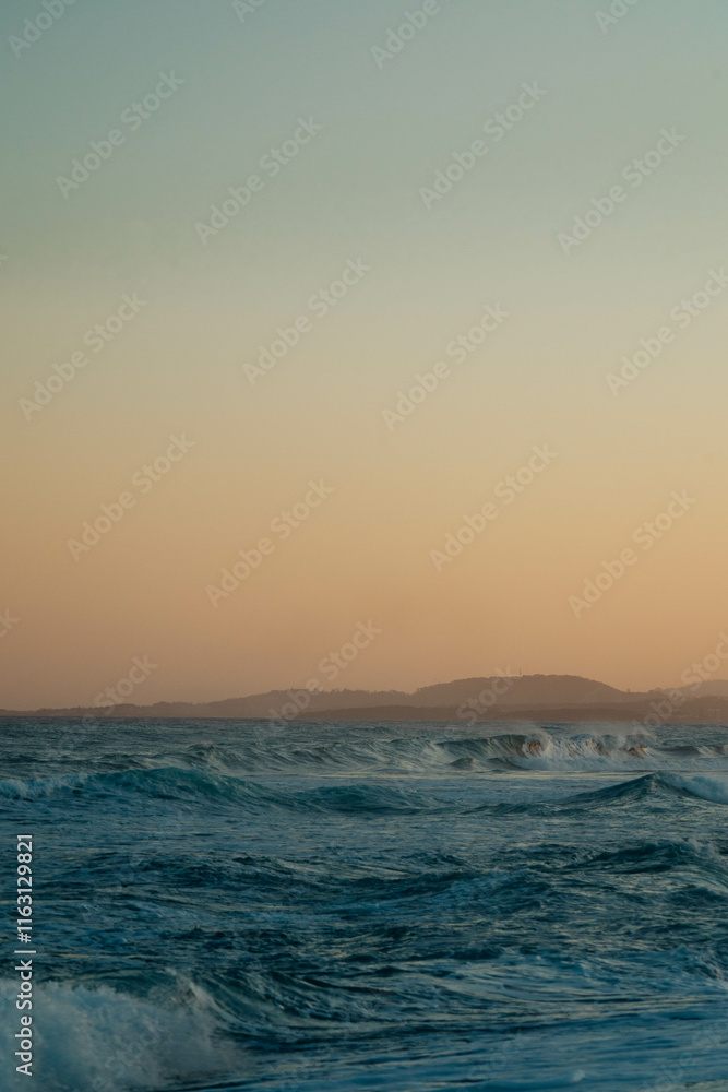 Fototapeta premium Beach at Sunset in portrait